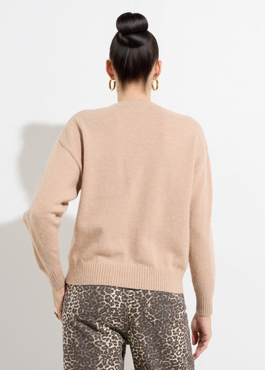 Pull col rond, perles et strass brillants Beige
