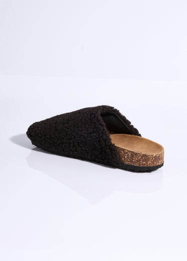 Mules en fourrure façon laine bouclée Noir