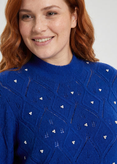 Pull doux ajouré perlé col montant Bleu