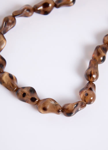 Collier avec perles de résine Marron