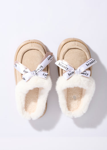 Mules fourrées compensées type mocassins Beige
