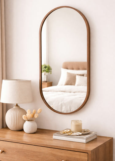 Miroir ovale avec contour fin en métal Marron