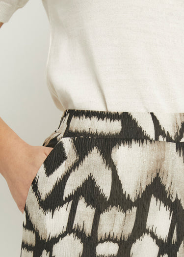 Pantalon large fluide imprimé ethnique Beige/Noir