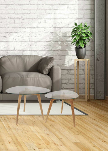 Tables verre forme galet et pied compas Transparent / Beige