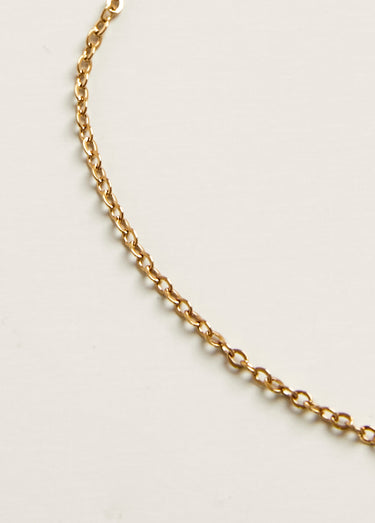 Collier pendentif strié en acier martelé Dore