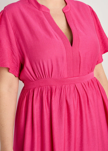 Robe longue surpiqures encolure + taille Fuchsia