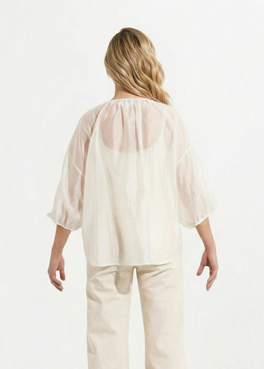 Blouse col V boutonnée à volants Blanc