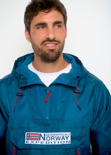 Coupe vent homme demi zip à capuche Petrole