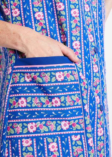 Tablier court sans manches boutonné Bleu