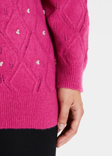 Pull doux ajouré perlé col montant Rose
