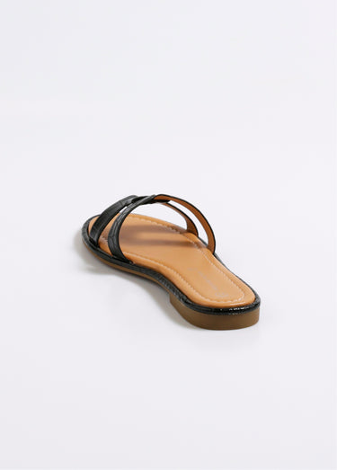 Mules plates chic façon croco Noir