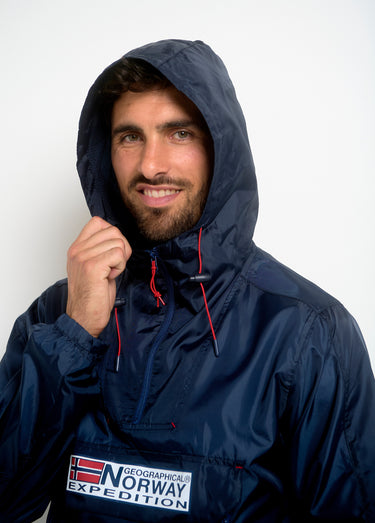 Coupe vent homme demi zip à capuche Marine