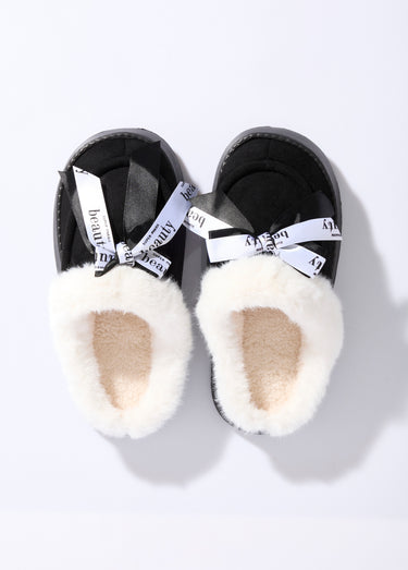 Mules fourrées compensées type mocassins Noir