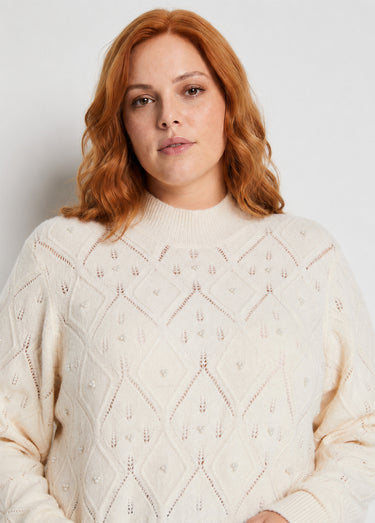 Pull doux ajouré perlé col montant Ecru