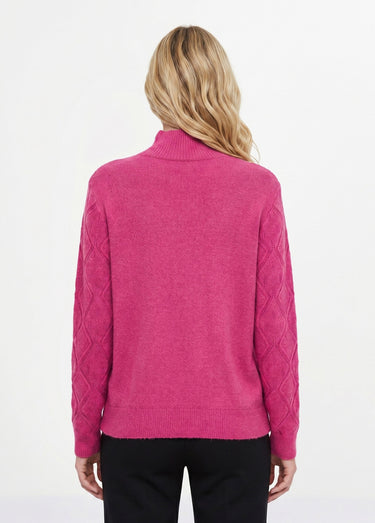 Pull doux ajouré perlé col montant Rose