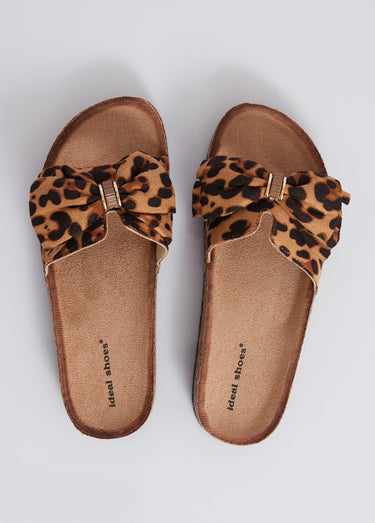 Mules plates effet liège avec nœud tissu Leopard