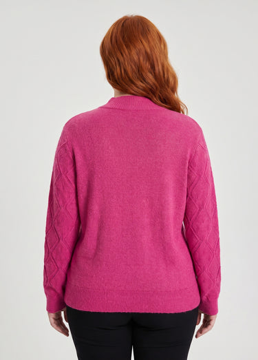 Pull doux ajouré perlé col montant Rose
