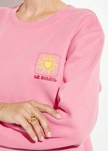Sweat molletonné sérigraphie soleil Rose