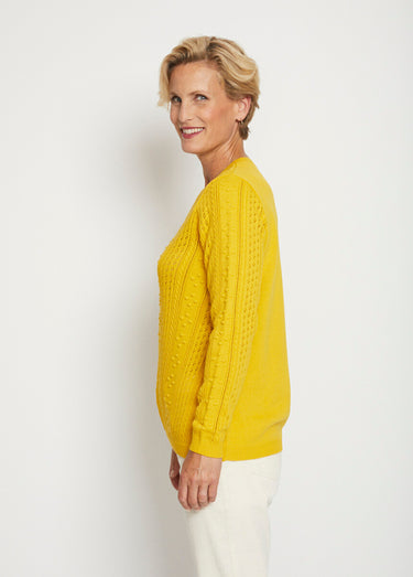 Pull col rond maille ajourée et boules Miel
