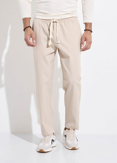 Pantalon sportswear en maille, élastiqué Beige