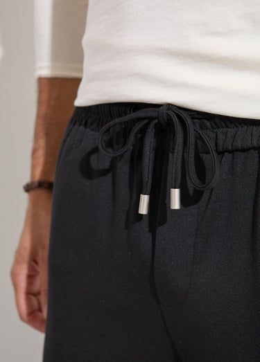 Pantalon coupe ajustée bas à revers Noir