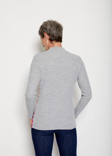 Pull court col montant maille côtelée Raye Fuschia