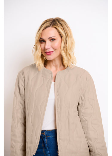 Veste unie matelassée zippée courte col rond Beige