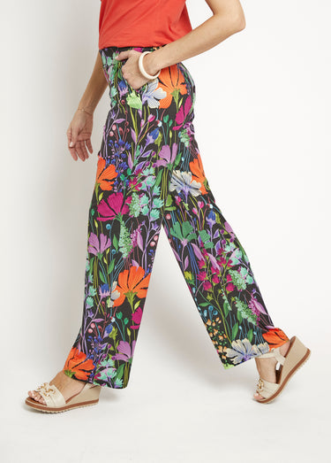 Pantalon fluide stretch, fleuri poétique Imprime Fond Noir