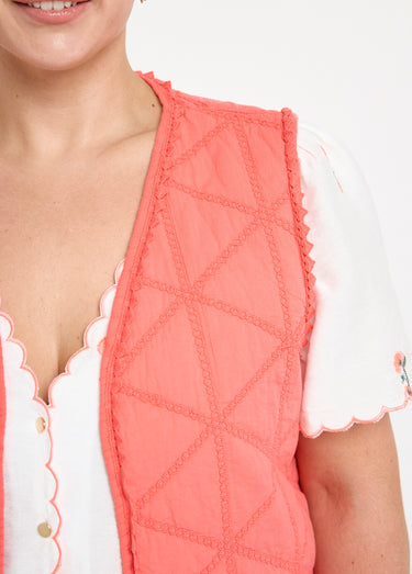 Veste matelassée brodée sans manches Corail