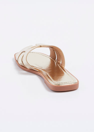 Mules plates chic avec jeu de brides Dore