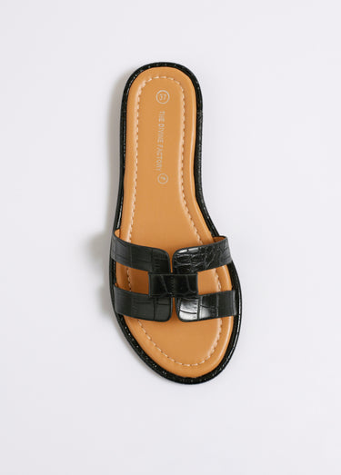 Mules plates chic façon croco Noir