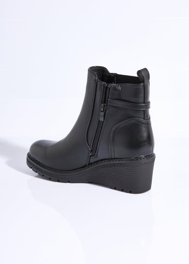 Boots bi matière avec semelle compensée Noir