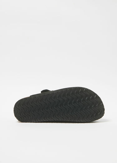 Mules tendance fourrées avec boucle Noir