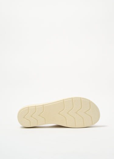 Mules à perforations, semelle compensée Dore