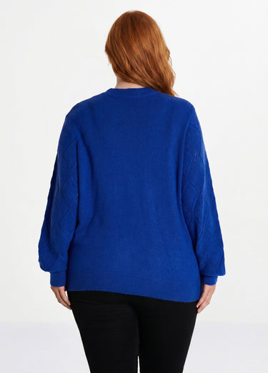 Pull doux ajouré perlé col montant Bleu