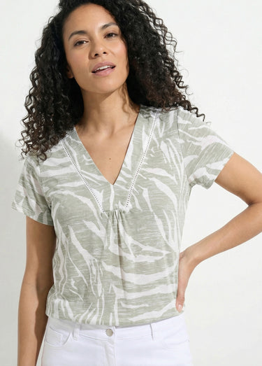 T-shirt col V imprimé manches courtes. Vert / Écru