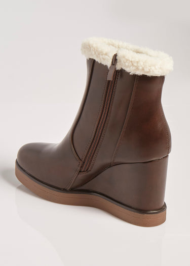 Boots fourrées à talon compensé Marron