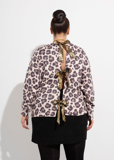 Pull maille léopard et noeuds pailletés Leopard