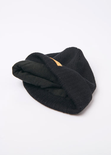 Bonnet chaud en maille fourré polaire Noir