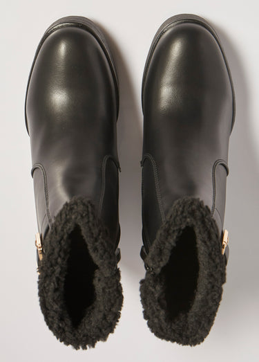 Boots fourrées à talon compensé Noir