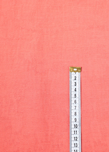 Coupon tissu habillement, ligné stretch Corail