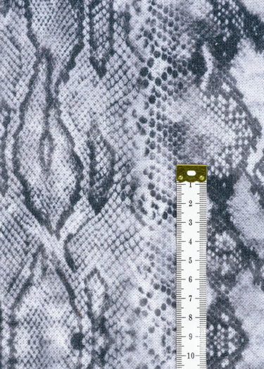 Coupon tissu habillement, motif reptile Imprime Gris