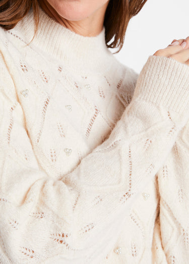 Pull doux ajouré perlé col montant Ecru
