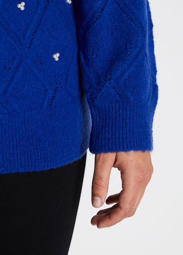 Pull doux ajouré perlé col montant Bleu