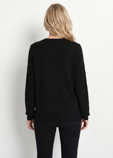 Pull doux ajouré perlé col montant Noir