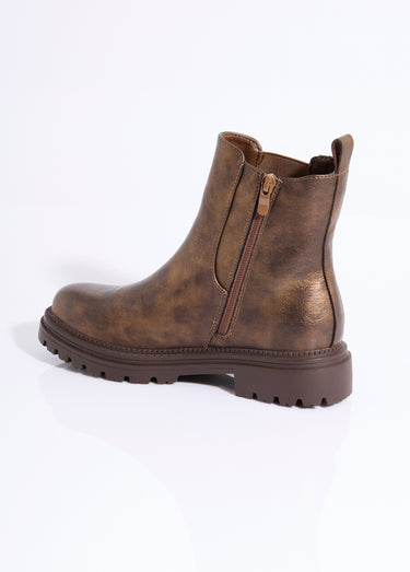 Boots Chelsea crantées détails matières Bronze