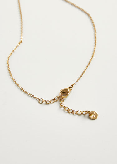 Collier pendentif strié en acier martelé Dore