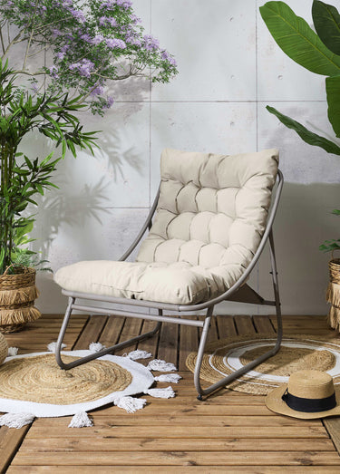 Fauteuil assise rembourrée et pied acier Beige