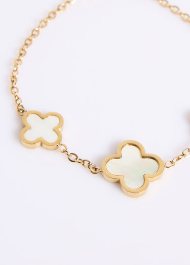 Bracelet avec breloques fleur acier inoxydable et nacre Dore