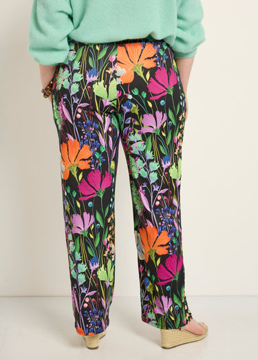 Pantalon fluide stretch, fleuri poétique Imprime Fond Noir